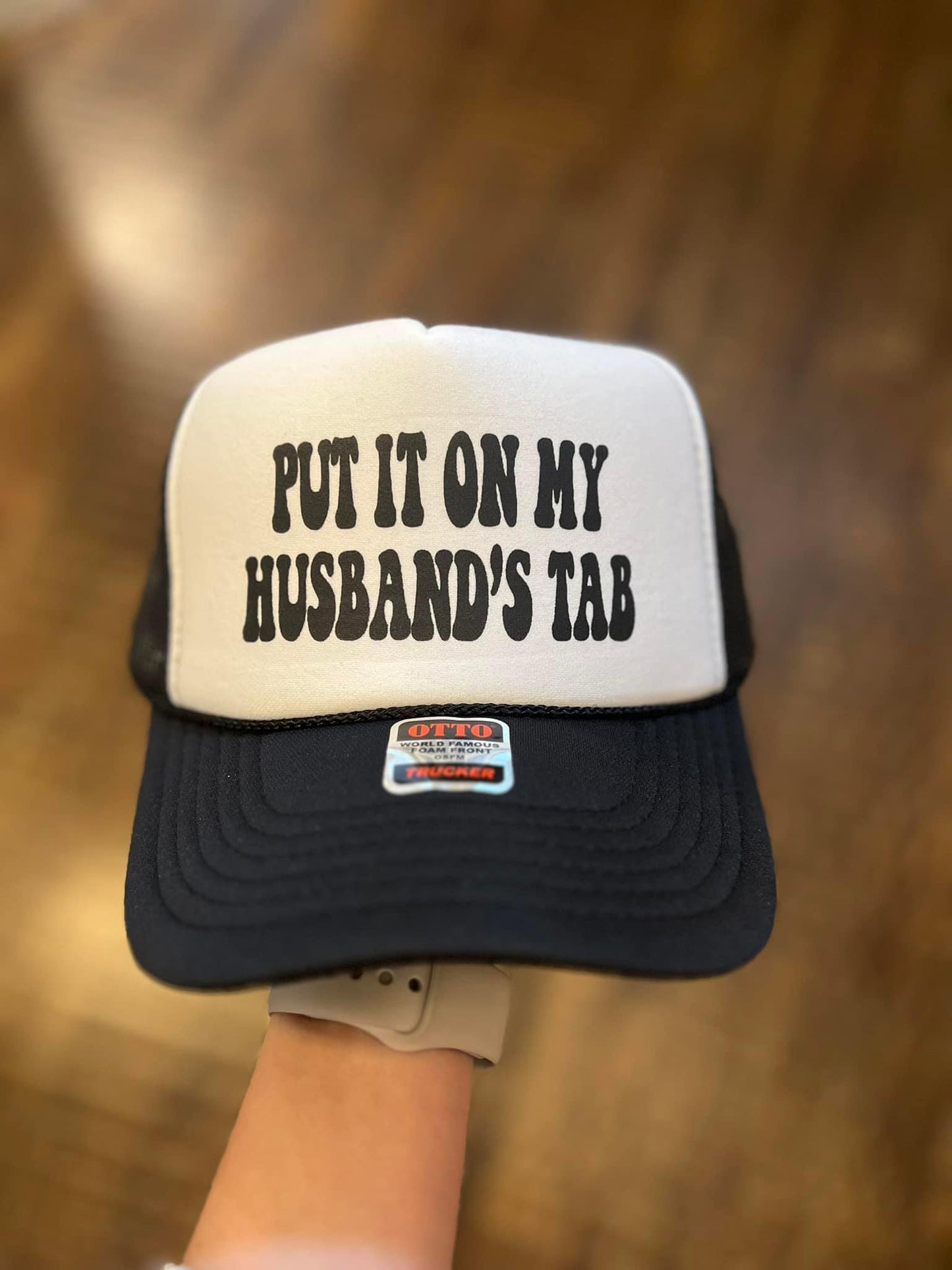 Put it on my Husbands Tab Hat