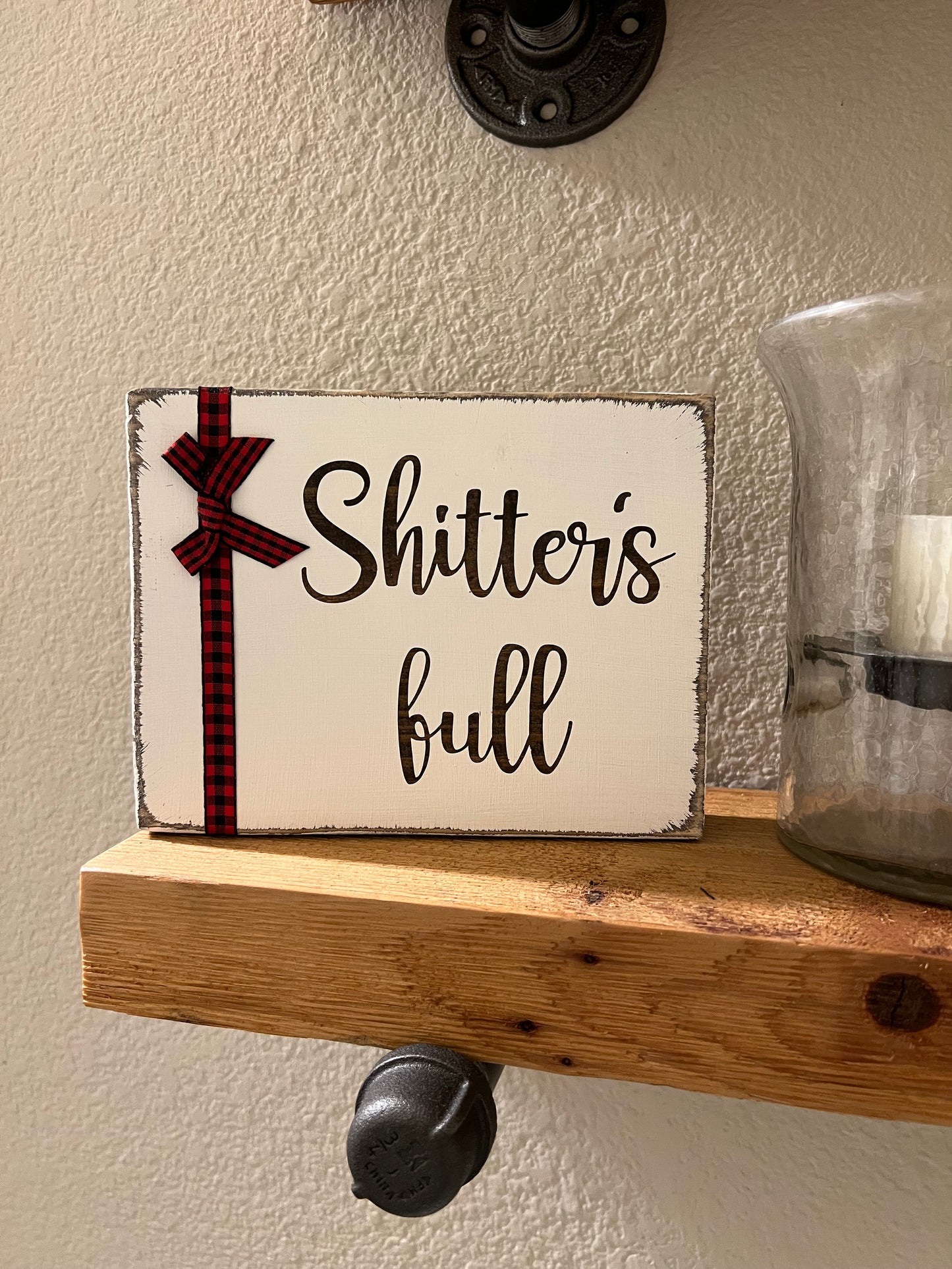 Shitter’s Full white Sign